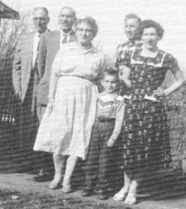 George Paterson family Jimmy, George, Ma Pat, Roy, Meda, grandson Perry Paterson / Photo 